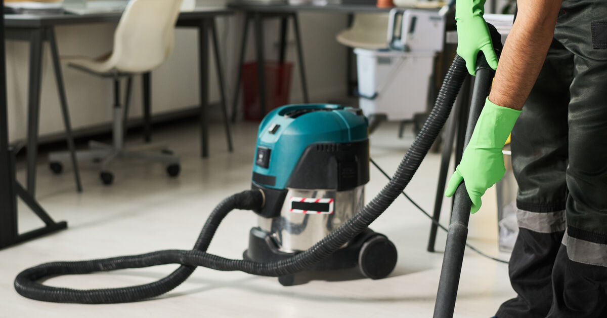 Professional team cleaning post-renovation dust