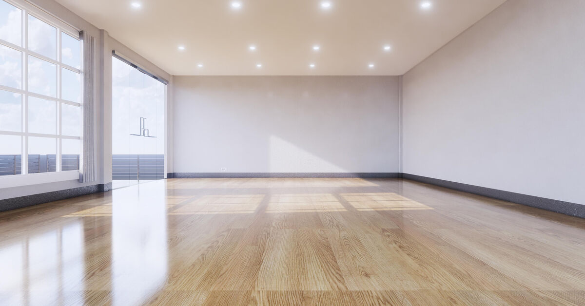 Clean laminate floor in empty room