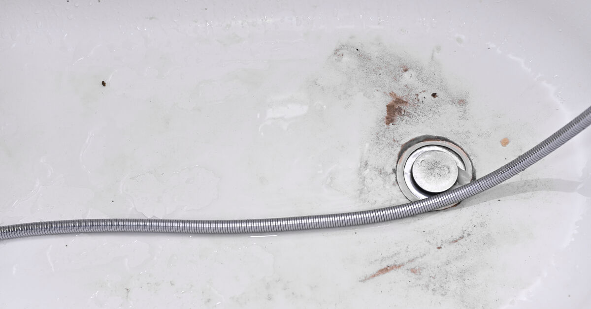 Water pooling around a bathtub drain